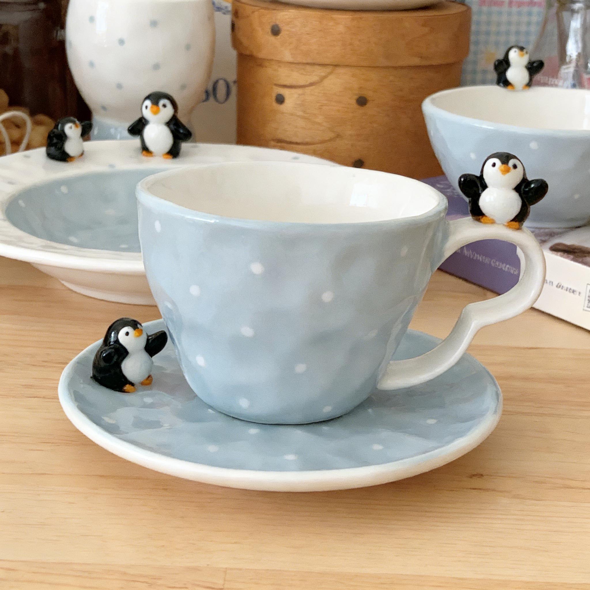 Penguin Perch Egg-Shaped Ceramic Coffee Cup & Saucer Set – 3D Penguin Handle & Saucer Design